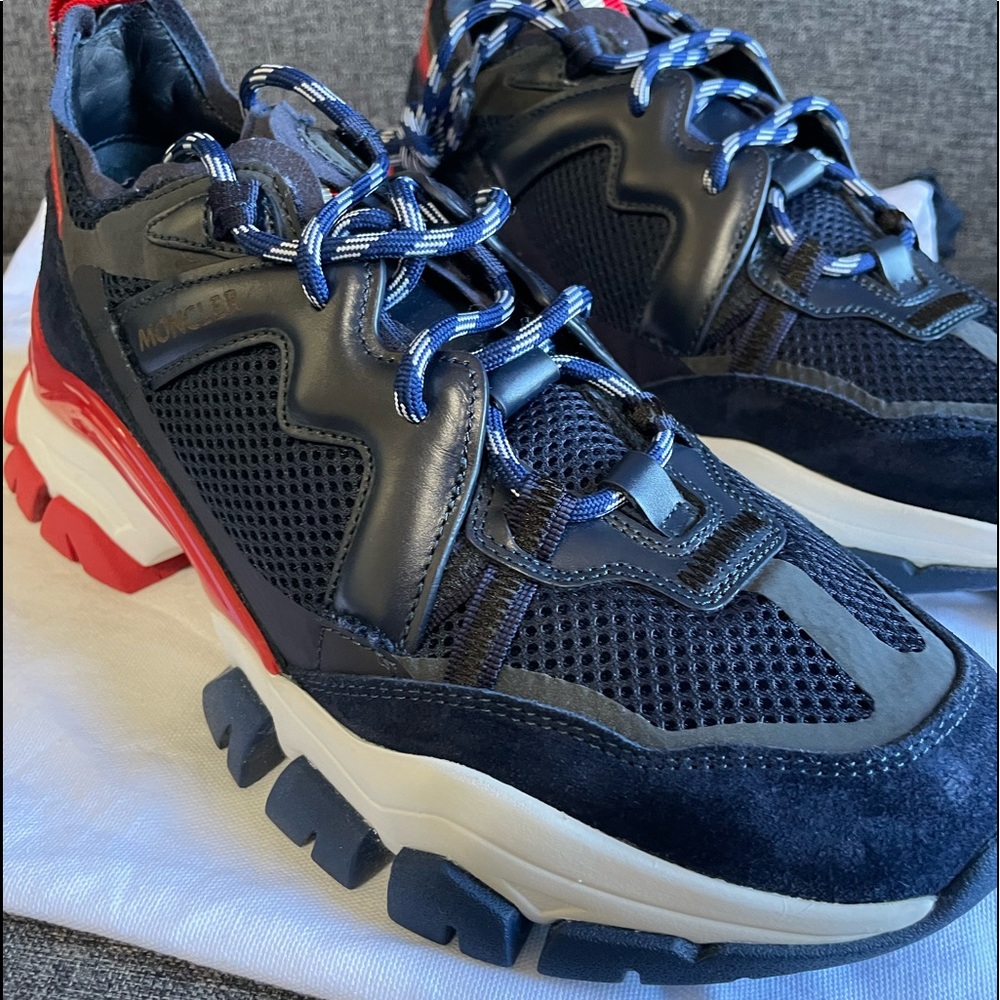 Brand new Moncler shoes size 40 never worn, no box but with Dust bags